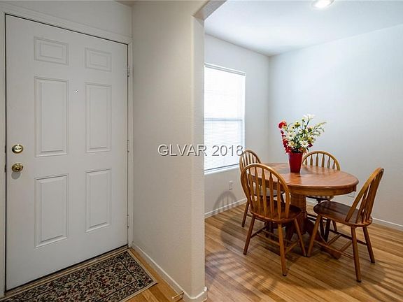 Front door with breakfast nook to left side