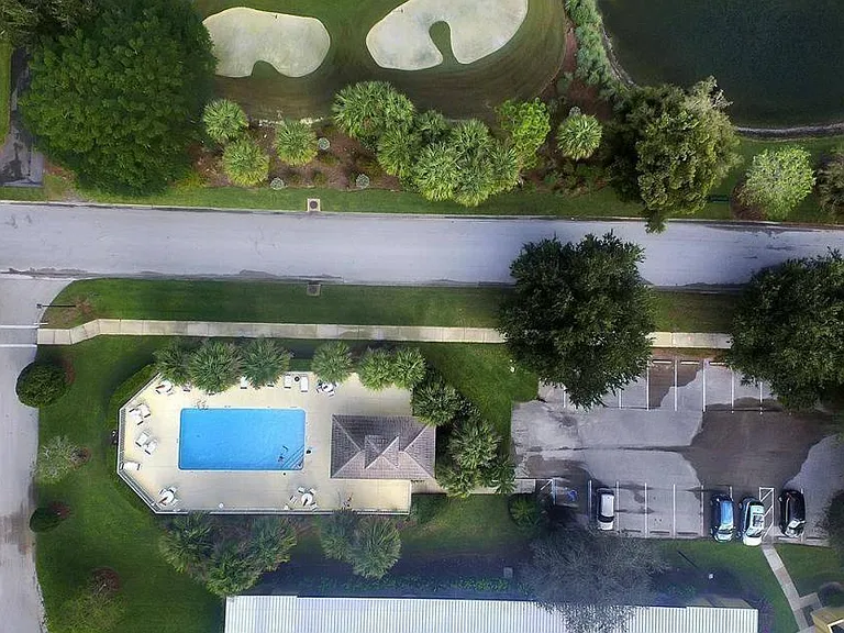 Aerial view of the community pool across from the condo