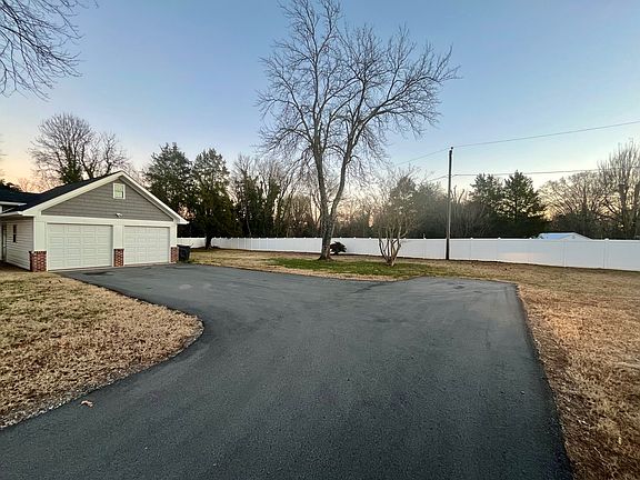 Paved Driveway with 2 car garage