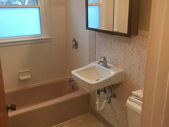 Recaulked, new sink and faucet. Cleaned.