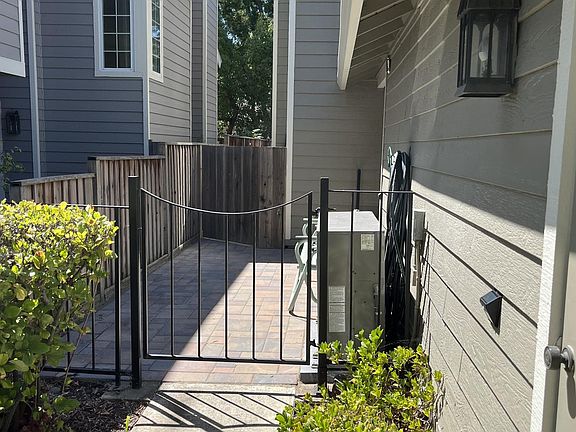 Entrance way area. Front door secluded around corner to right past A/C unit.