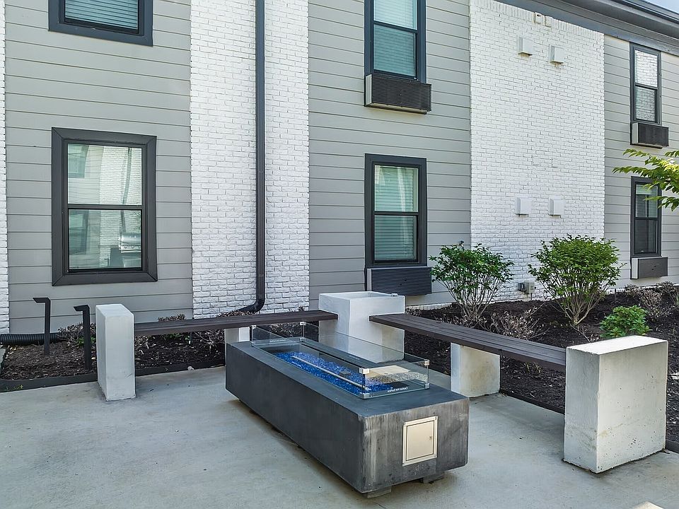 Experience tranquility in this stylish outdoor patio, perfect for relaxation.