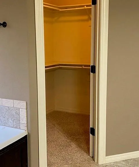 Master bath has separate walk in closets.