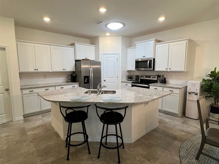 5375 NW 48th Pl — Photo 3
