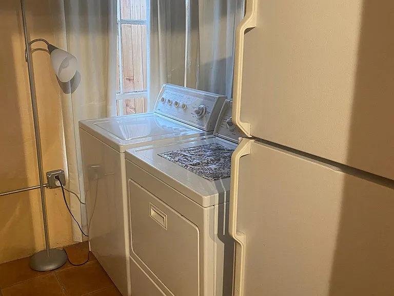 laundry room, refrigerator and large closet