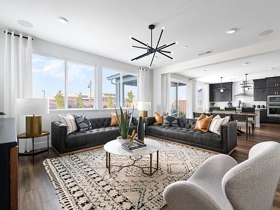 Spacious gathering room overlooking the kitchen
