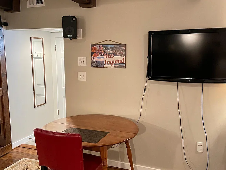 Dining table and wall mounted TV