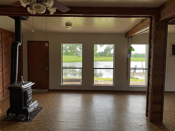 Look at that show stopping view showing how well manicured the grounds are with private lake. Imagine the possibilities in this space. In winter you'll appreciate the wood burning fireplace!