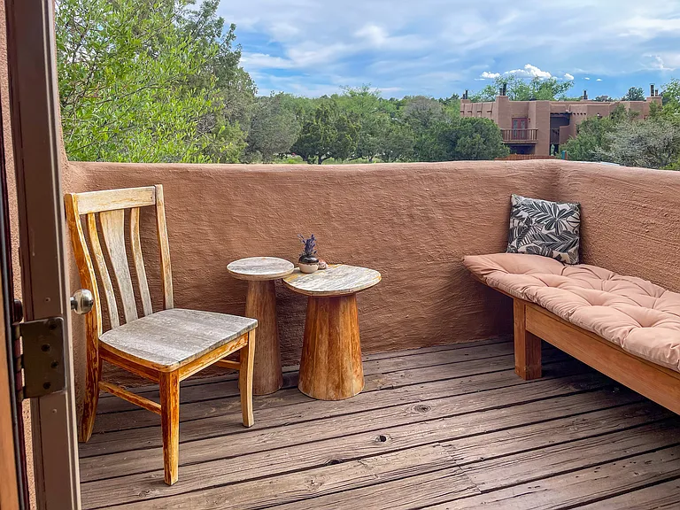 Balcony off the living room offers additional outdoor living space