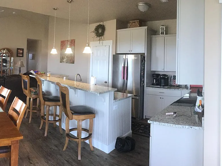 Dining, living room and kitchen, laundry room on the right