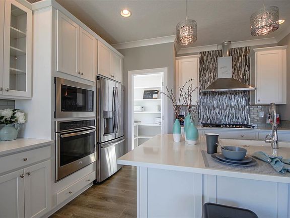 Floor plans and photos shown may include base features along with additional options and upgrades.