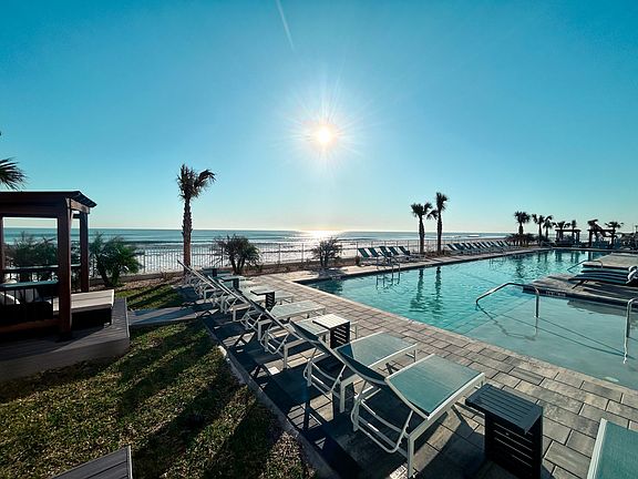 Bask in the sun by the poolside and soak up the perfect day of leisure.