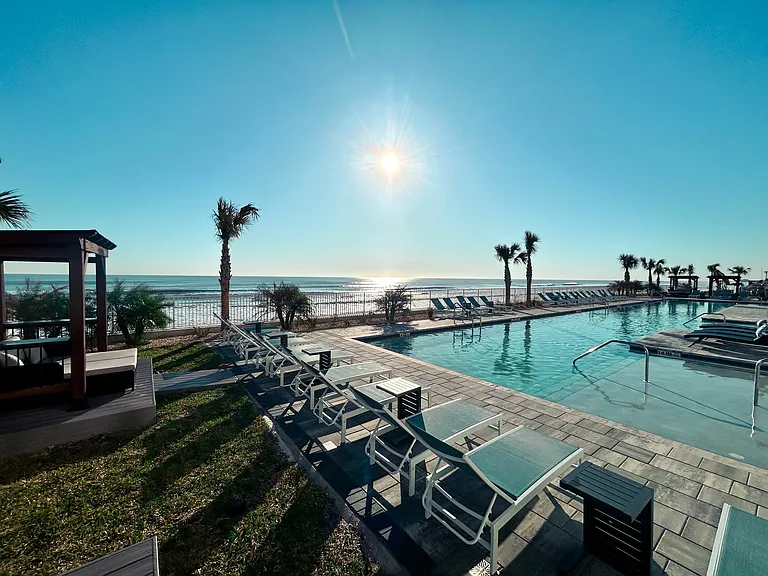 Bask in the sun by the poolside and soak up the perfect day of leisure.