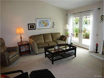 Spacious & Light Living Room with Fireplace & French Doors to Ba