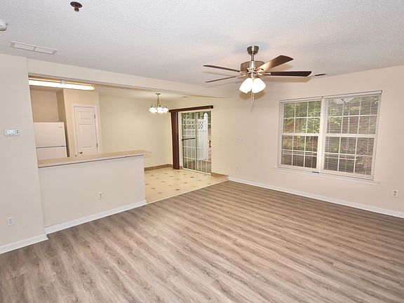 Views from spacious family room showing open kitchen & breakfast area