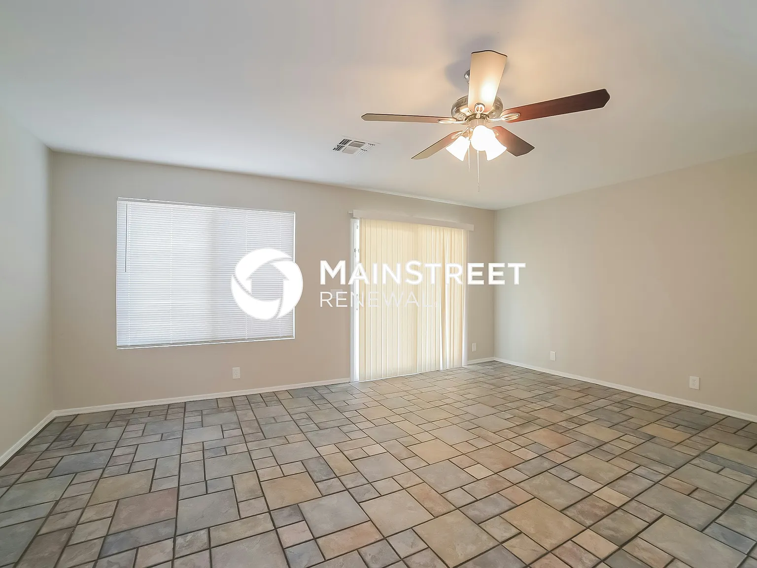 8645 W Mauro Ln — Photo 2