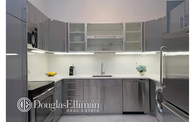 Sold by Douglas Elliman | media 13