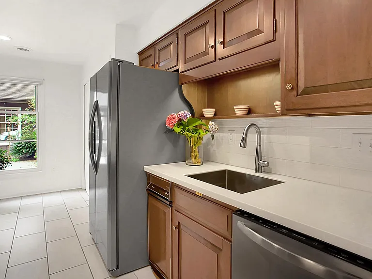 Deep Stainless Steel Sink 
Abundant Storage
Solid Cherry Custom Cabinets