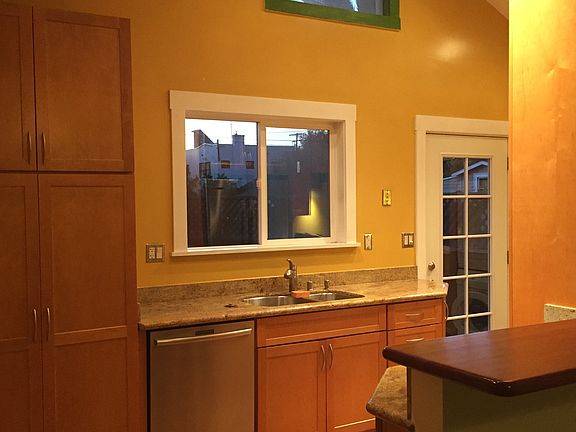 Kitchen and backdoor to back deck; taken from dining room