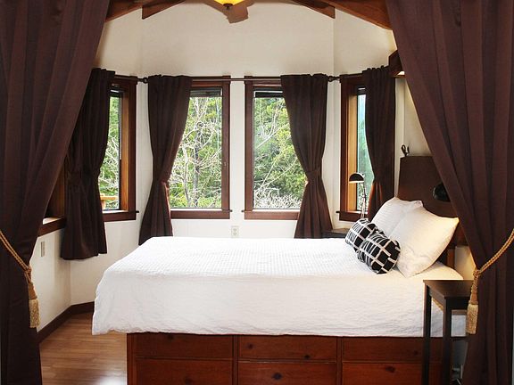 Tree and mountain views from bedroom in Octagon