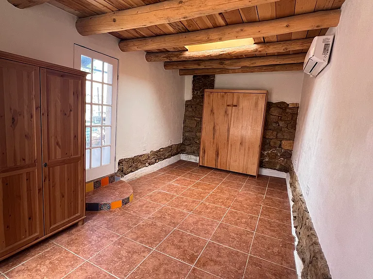 Studio contains murphy bed and armoire, making it possible to use as a second bedroom.