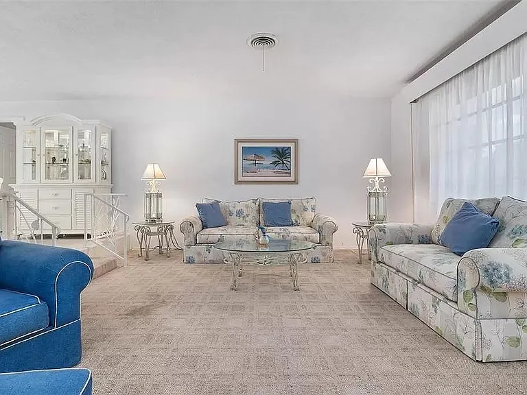 Living Room (carpet has been replaced with wood-look Luxury Vinyl Plank)