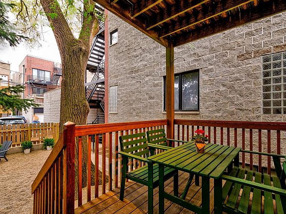Private back deck for Unit #1R. Ground backyard is used by Unit #2.
