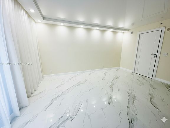 5th image of 3500 Mystic Pointe Dr APT 1107