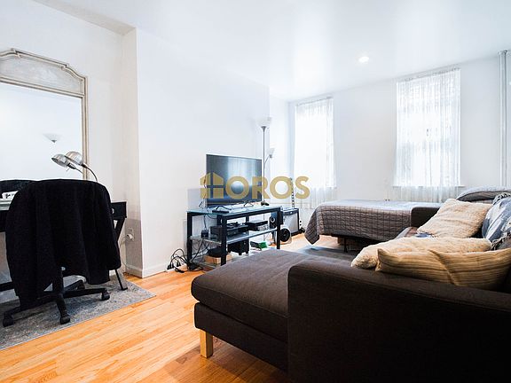 2nd image of 236 E 7th St APT 3C