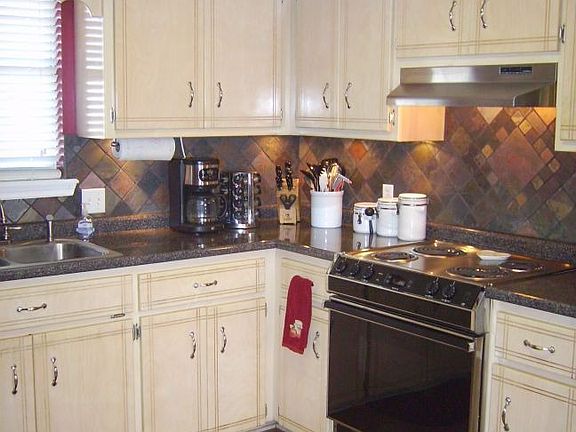 Kitchen - New Floors, countertops, tile, paint, backsplash