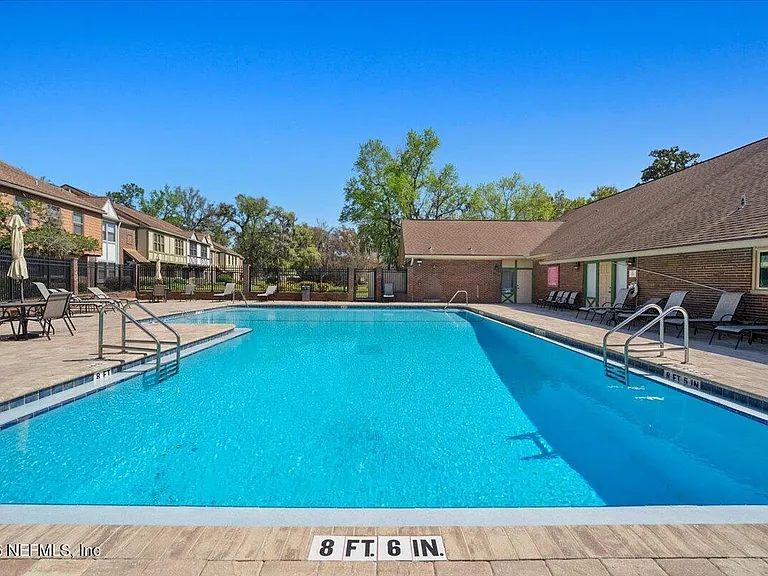 8140 Sutton Pl E — Photo 40