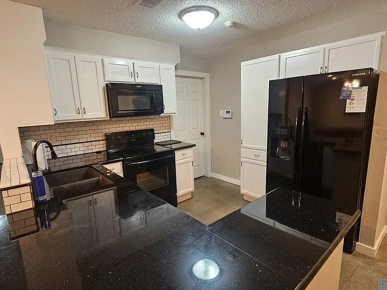 8708 Montclair St — Photo 3