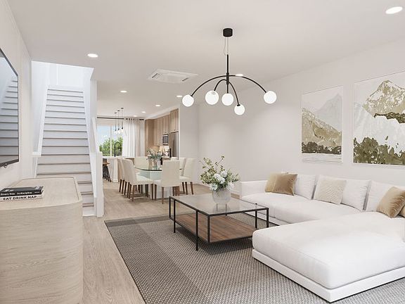 Gathering room leading into kitchen area