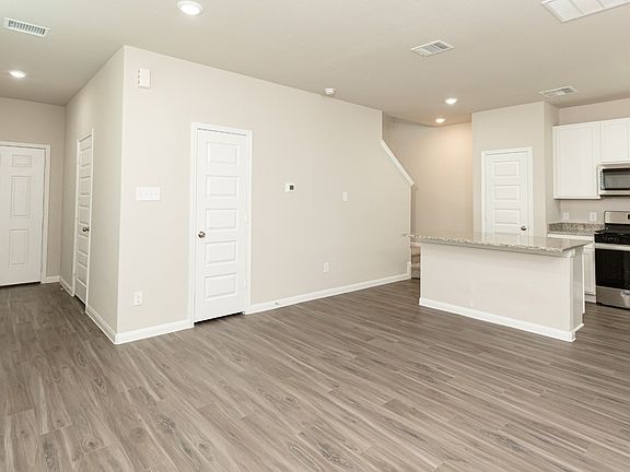 Family Room to Dining Area and Kitchen