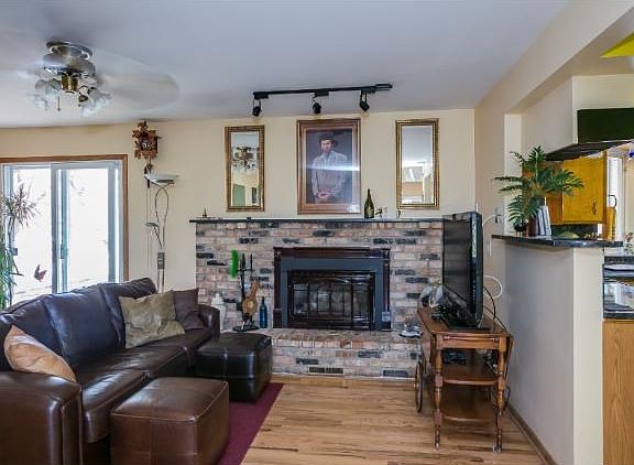 Beautiful gas burning fireplace makes a great focal point for arranging your furniture whether it be part of the huge family room, a den or dining room!