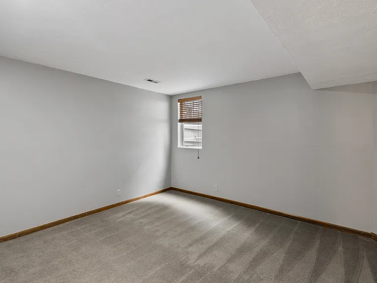Basement bedroom w egress window