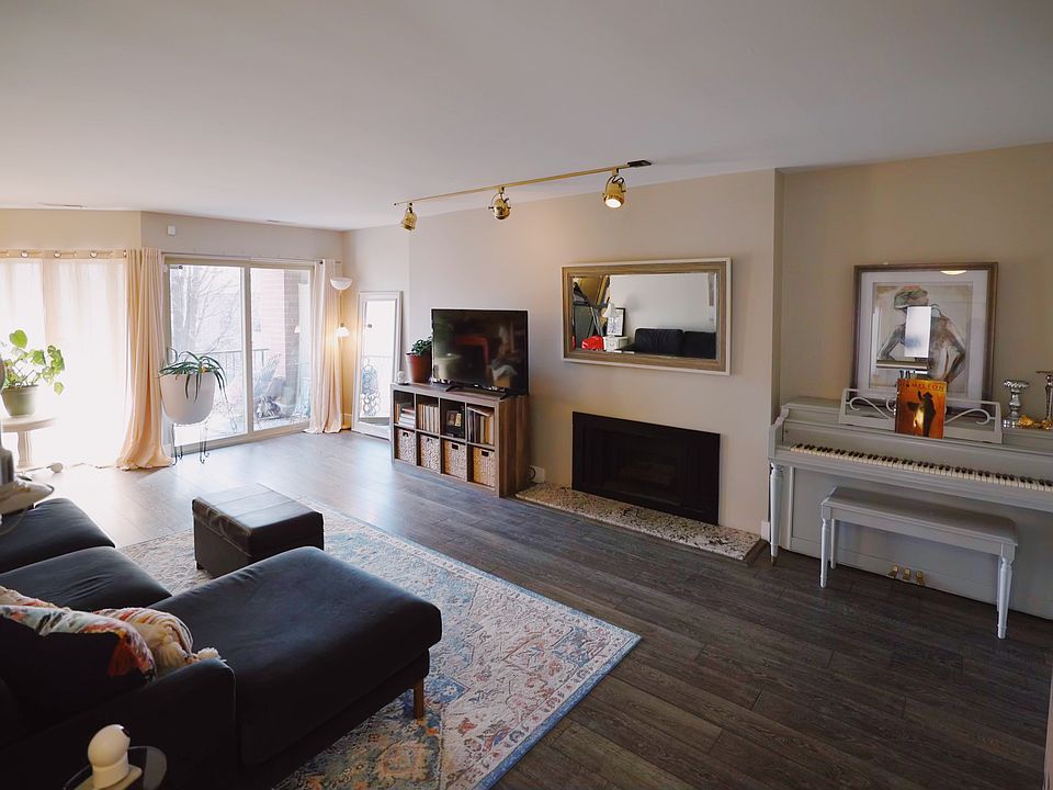 Living Room with Fire Place and Balcony