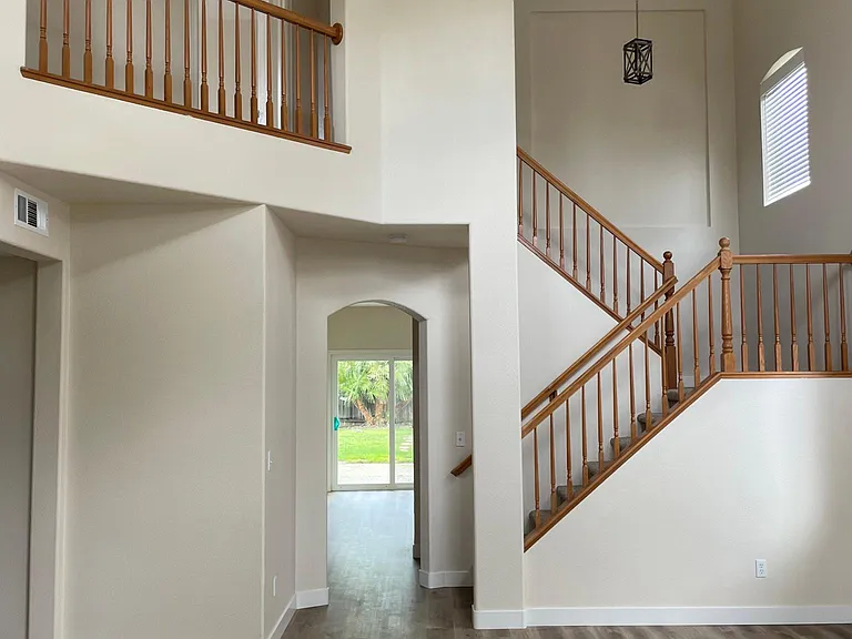 Family room leading into the kitchen and backyard.