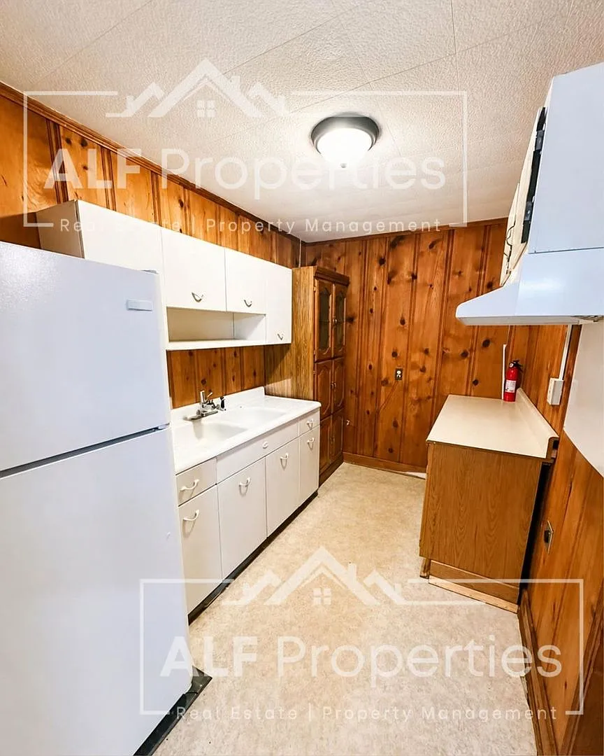 Charming 2-Bedroom Home with Bonus Sunroom, Covered Patio & Fenced Backyard — Photo 4