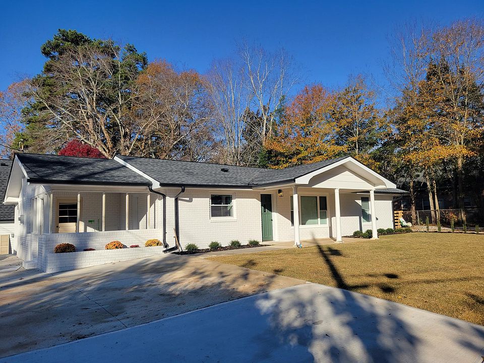 House front, concrete driveway