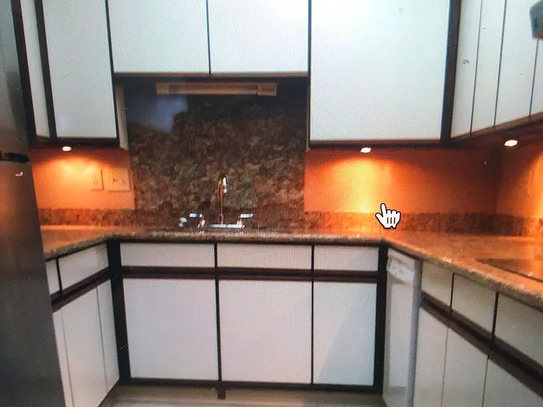 granite counter top, stainless steel appliances. cabinets plus pantry .