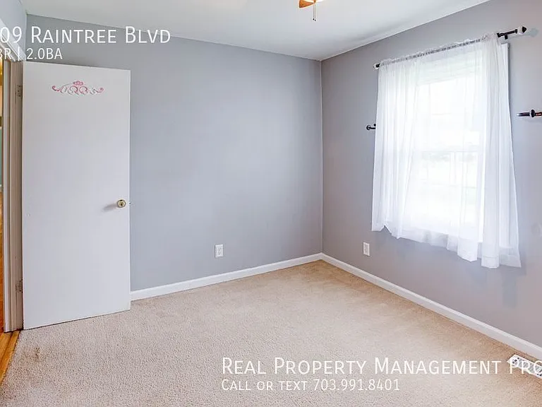 209 Raintree Blvd — Photo 37