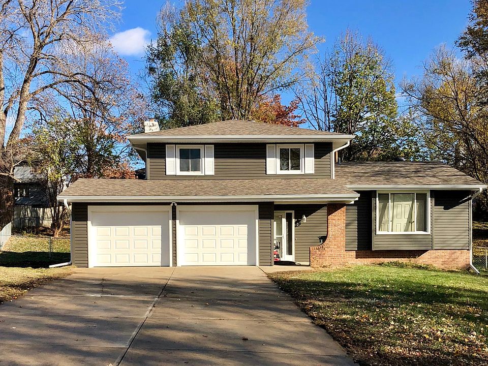 Brand new paint, roof, gutters, garage doors, and glass door.