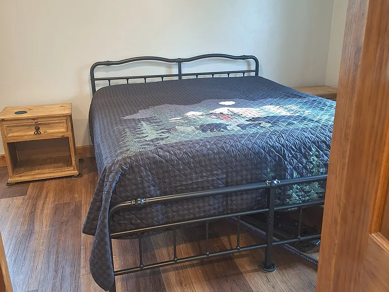 California King bed in front master bedroom.