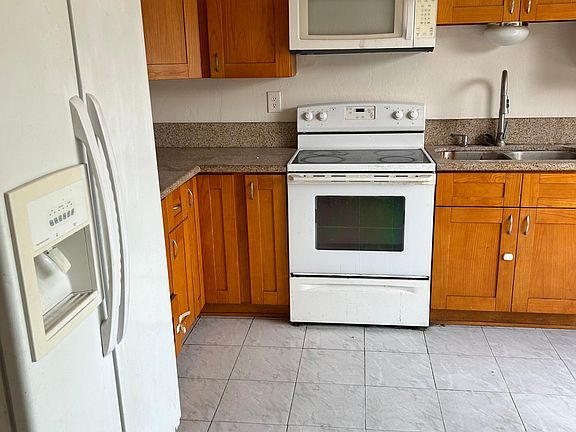 recently remodeled kitchen with granite countertops