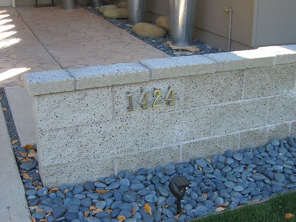 Break wall and river stones - some of the entirely landscaped property