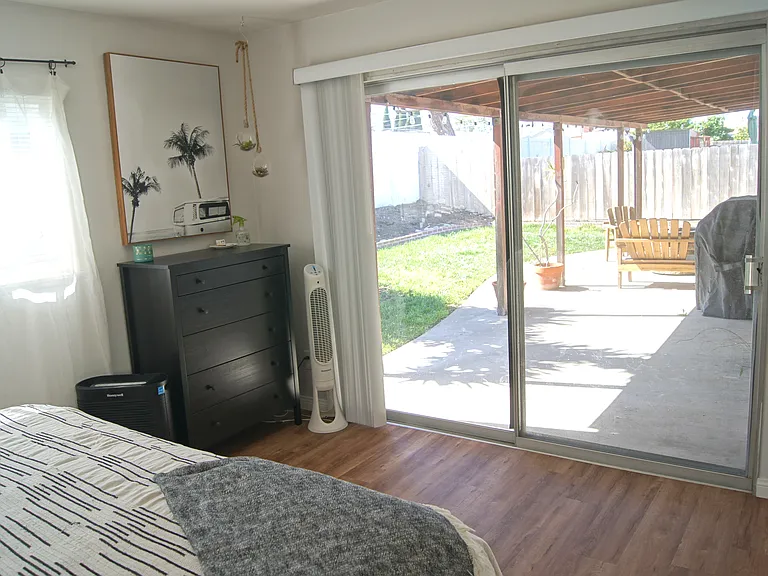 Bedroom 1 with Slider to Patio.