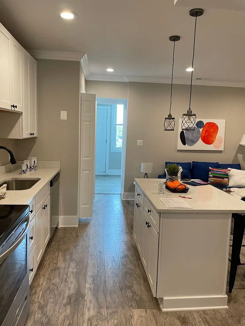 Trendy 2BR Trinidad Condo with Modern Finishes & In-Unit Laundry — Photo 1