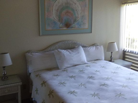 King size bed in the master bedroom