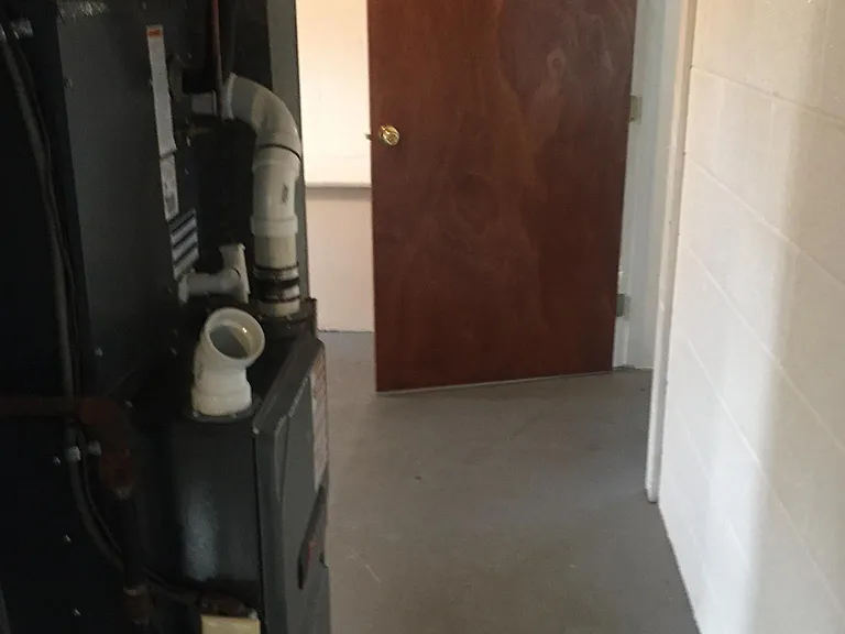 Furnace area between laundry and possible 3rd bedroom downstairs.